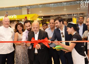 Ribbon Cutting Image Left to Right - Anthony Carron, Sapna Jeswani, Deepak Khushalani, Micky Jagtiani, Omer Ali, Kishen Khushalani, Manish Jeswani, Neelesh Bhatnagar, Ashraf Bahrawi, Rosario Accaria.