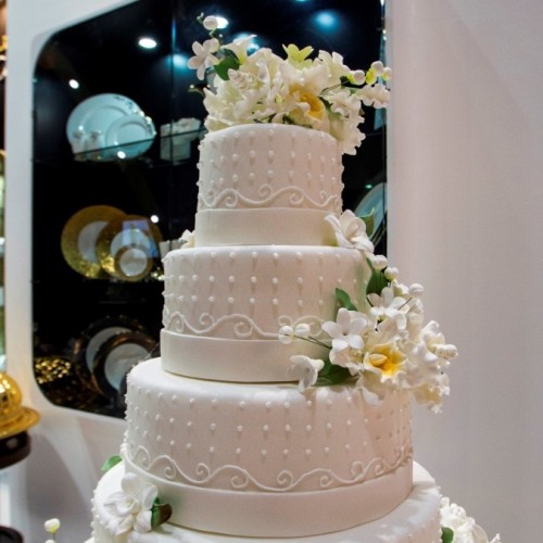 For Royal Catering, the wedding cake is as much a dessert as a piece of art and entertainment